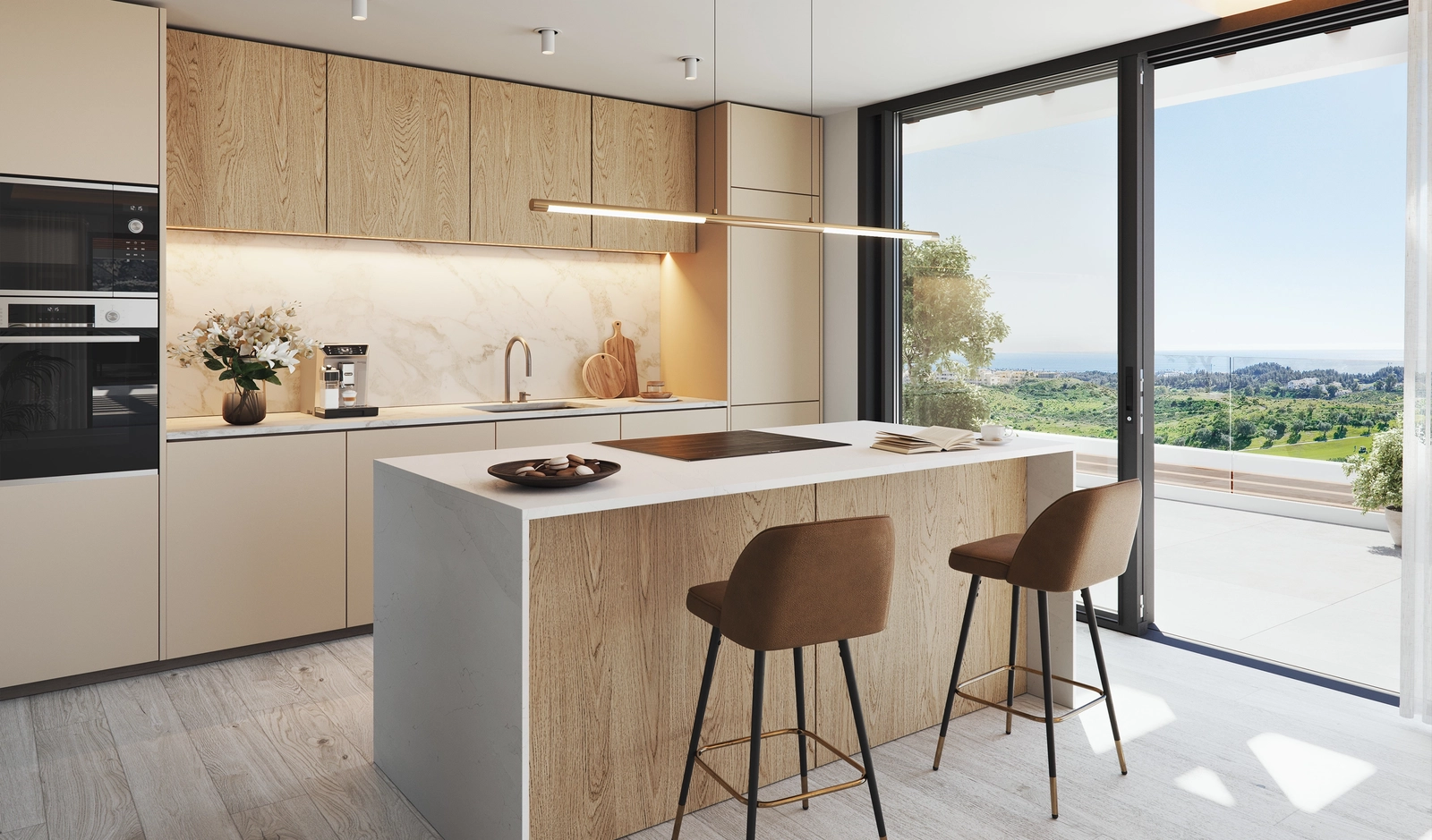 Et moderne køkken med premium hårde hvidevarer og åben udsigt over Mijas og det omkringliggende landskab.