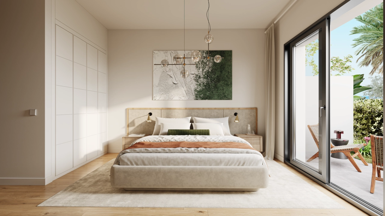 Et fredfyldt soveværelse designet til hvile og afslapning, med direkte adgang til et udendørs område.