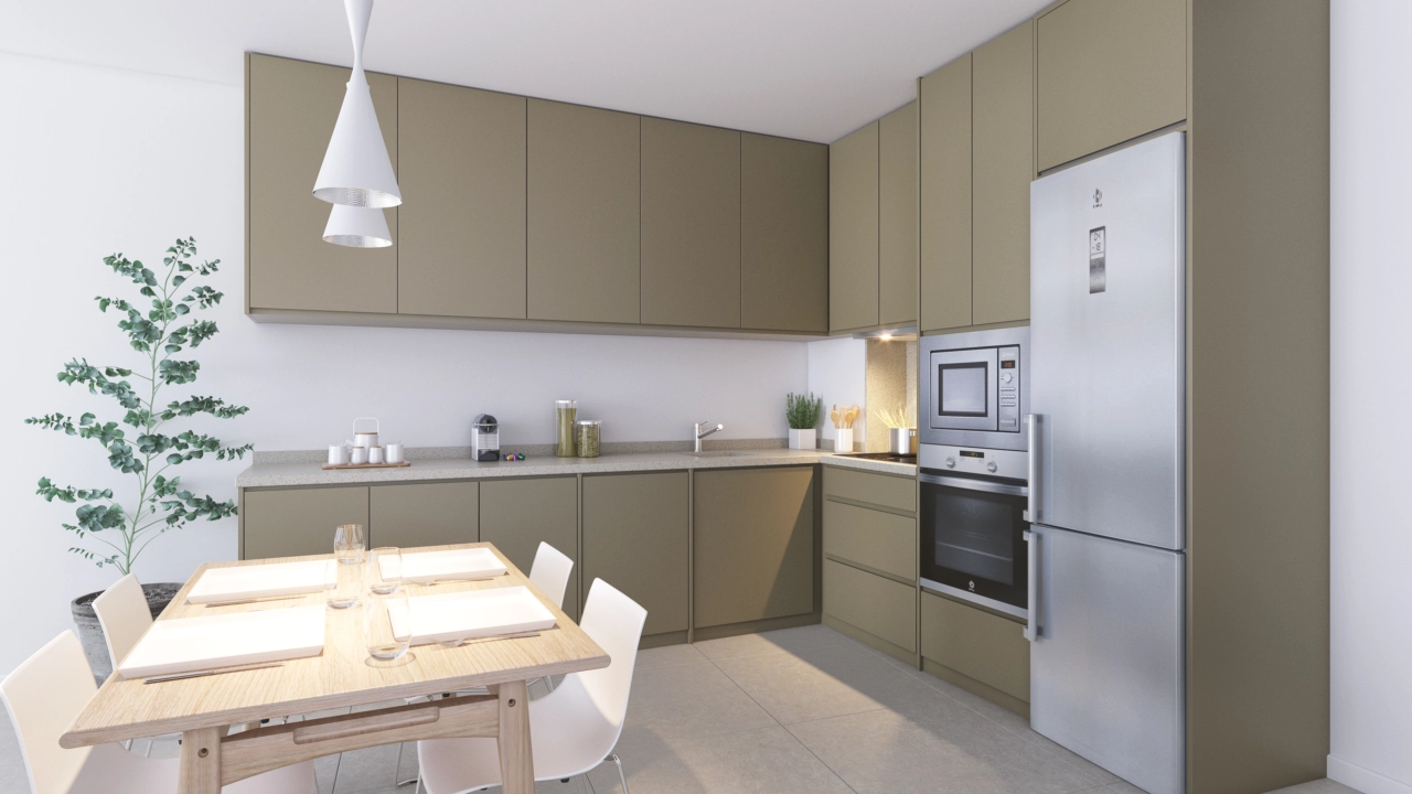 Et fuldt udstyret, moderne køkken med hvidevarer af høj kvalitet og stilfulde finish, klar til din nydelse.