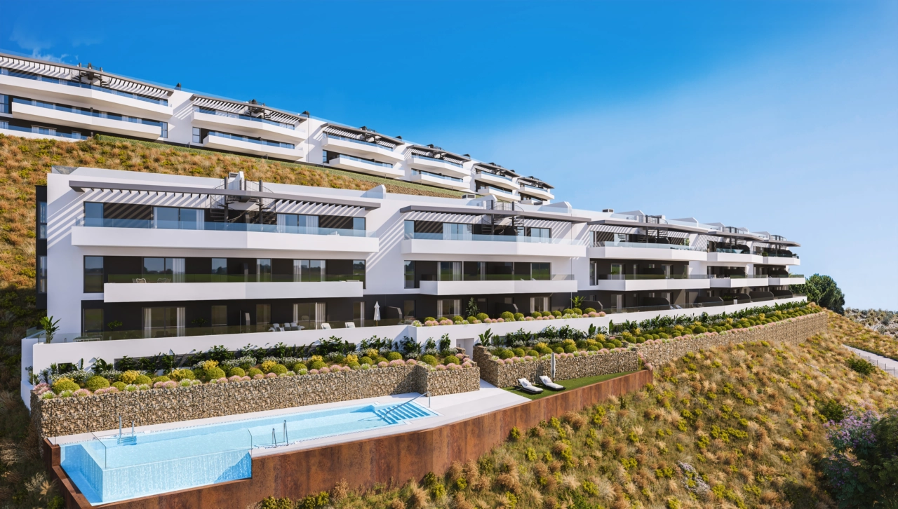 En udsigt over det stilfulde lejlighedskompleks, designet til at smelte sammen med det naturlige landskab.