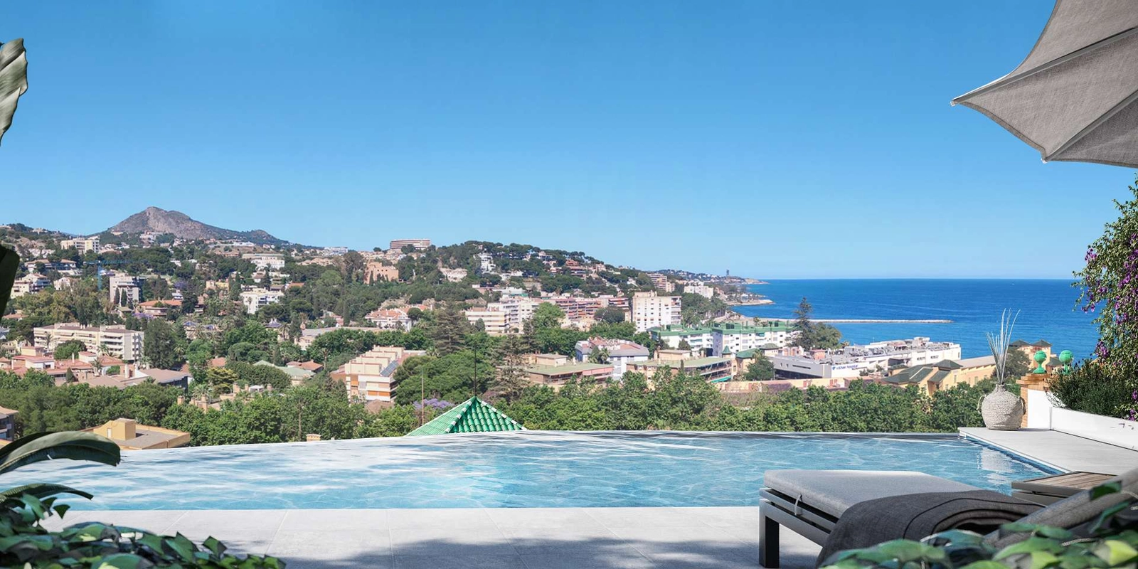 Nyd den betagende panoramaudsigt over Malaga og Middelhavet fra beboernes pool.