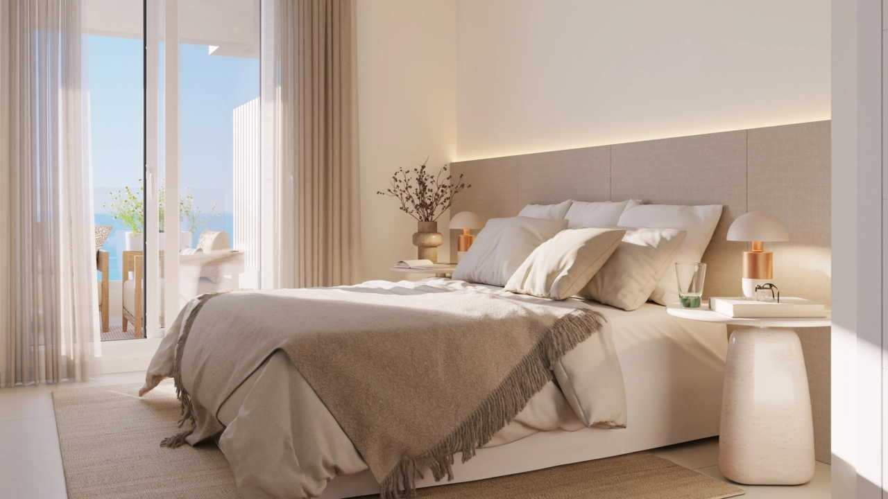 Master soveværelset tilbyder et fredfyldt tilbagetog med direkte adgang til terrassen.