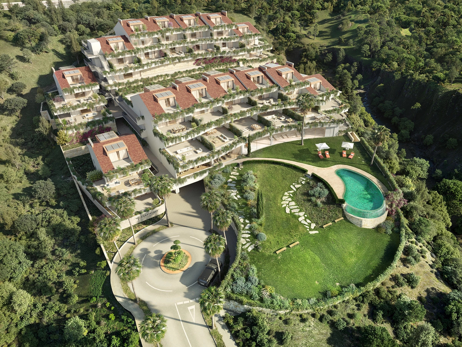 En imponerende udsigt over hele bebyggelsen, der fremhæver dens unikke terrassearkitektur og grønne omgivelser.