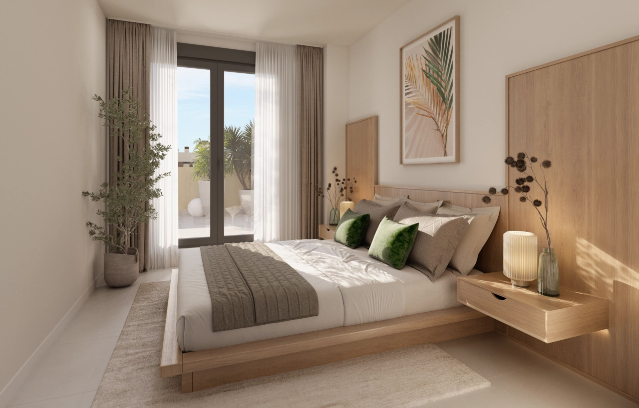 Hovedsoveværelset er et fredfyldt tilflugtssted, der tilbyder komfort, stil og direkte adgang til en privat terrasse.