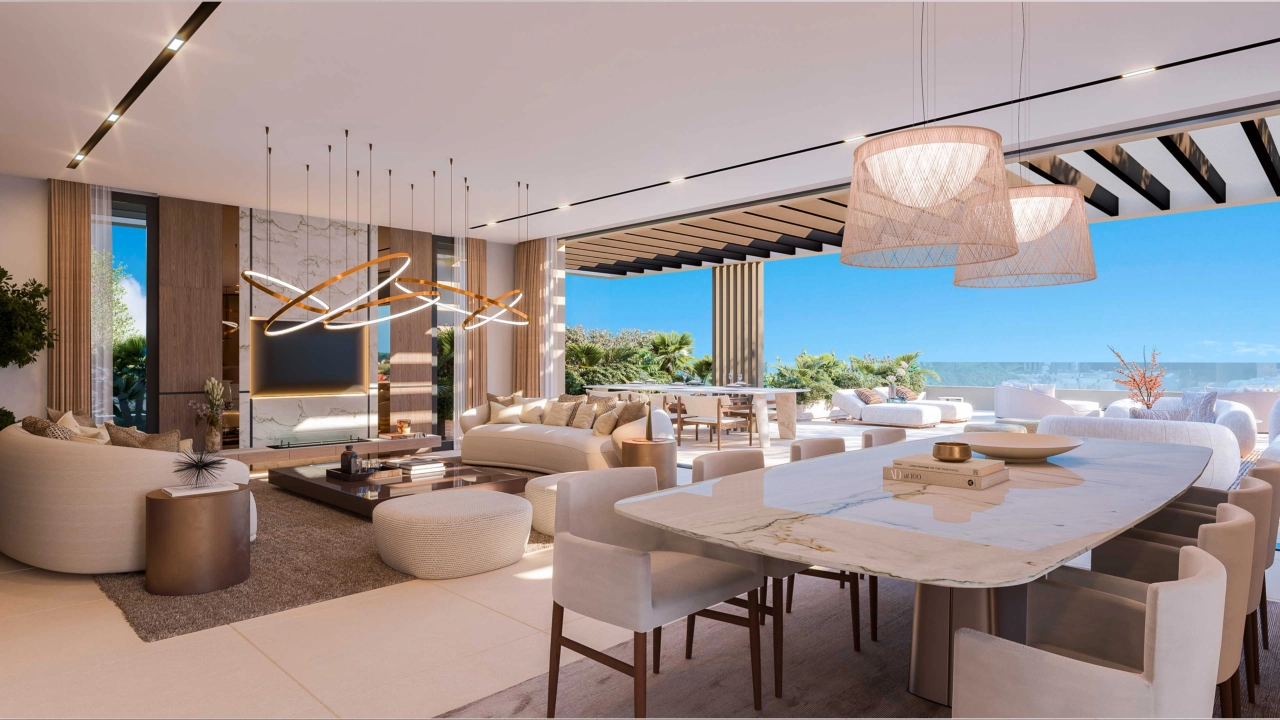 Et elegant, åbent stue- og spiseområde designet til komfort og fyldt med naturligt lys.