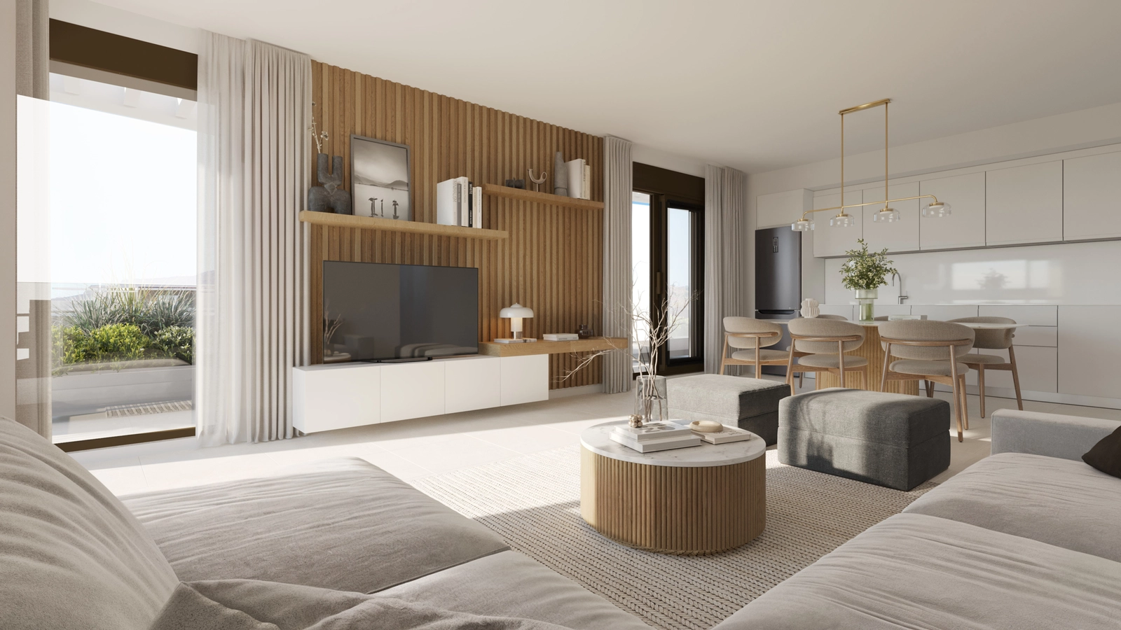 Et kig ind i det moderne opholdsrum, der viser det integrerede køkken og elegante designmæssige detaljer.