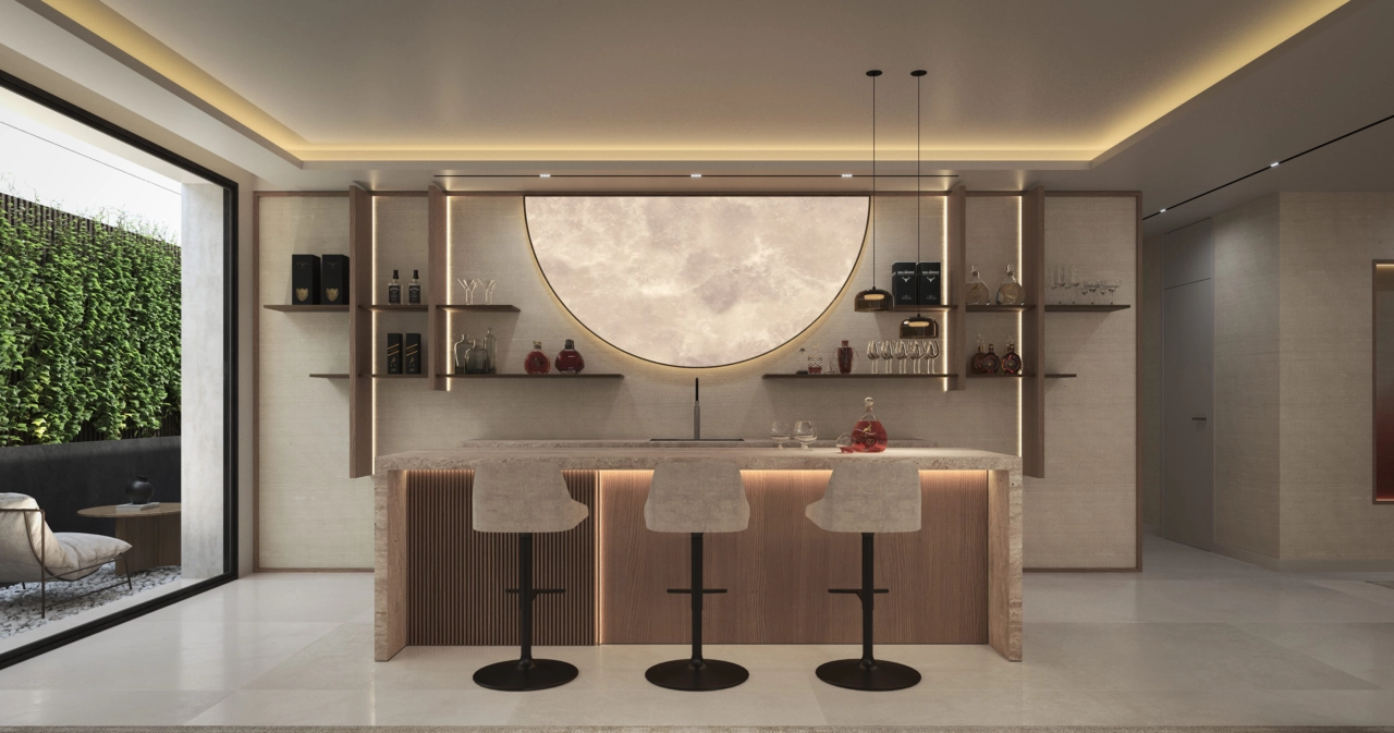 Et stilfuldt bar- og loungeområde i kælderen tilbyder et sofistikeret rum til at samle venner og familie.