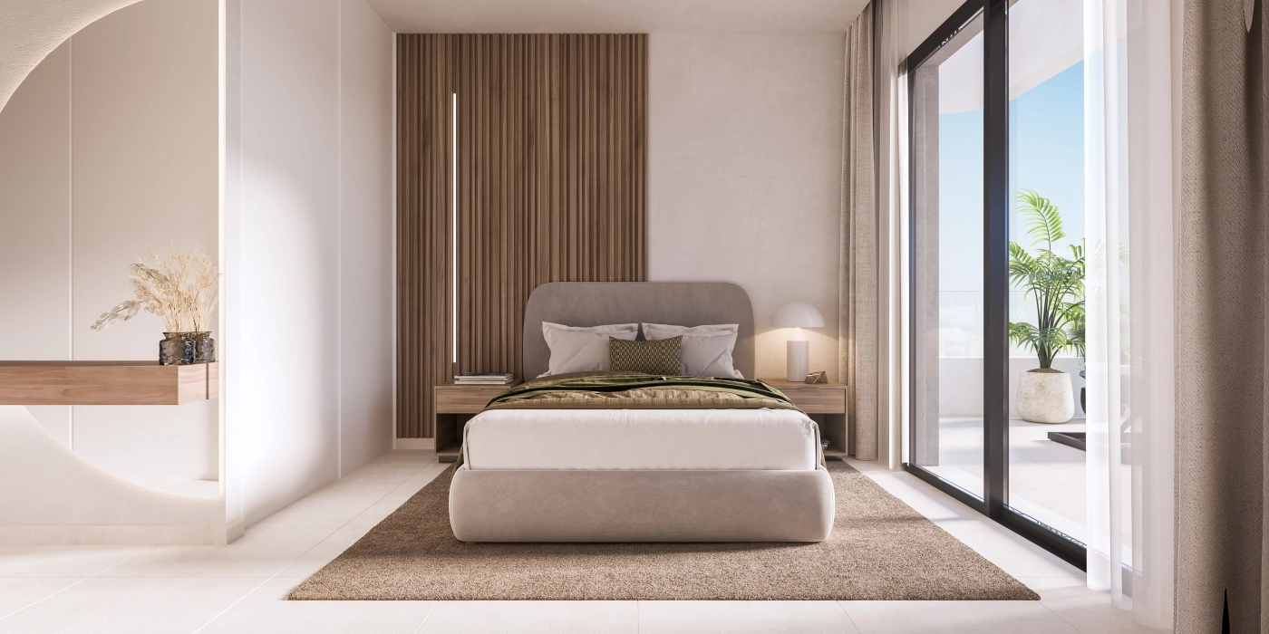 Et roligt soveværelse med moderne design og direkte adgang til en privat terrasse, der skaber et personligt tilflugtssted.