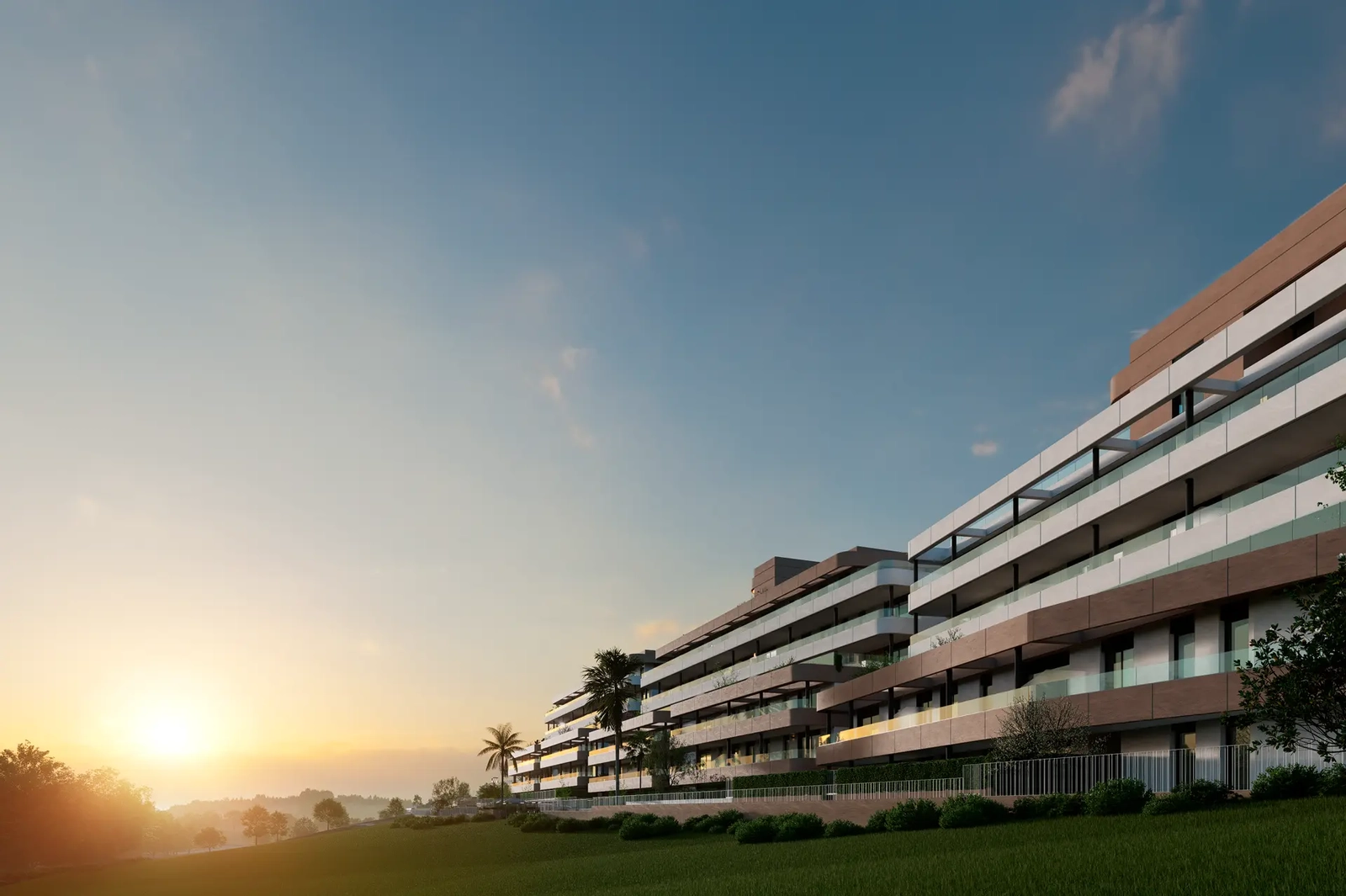 Byggeriets moderne arkitektur skinner smukt i solnedgangens gyldne time.
