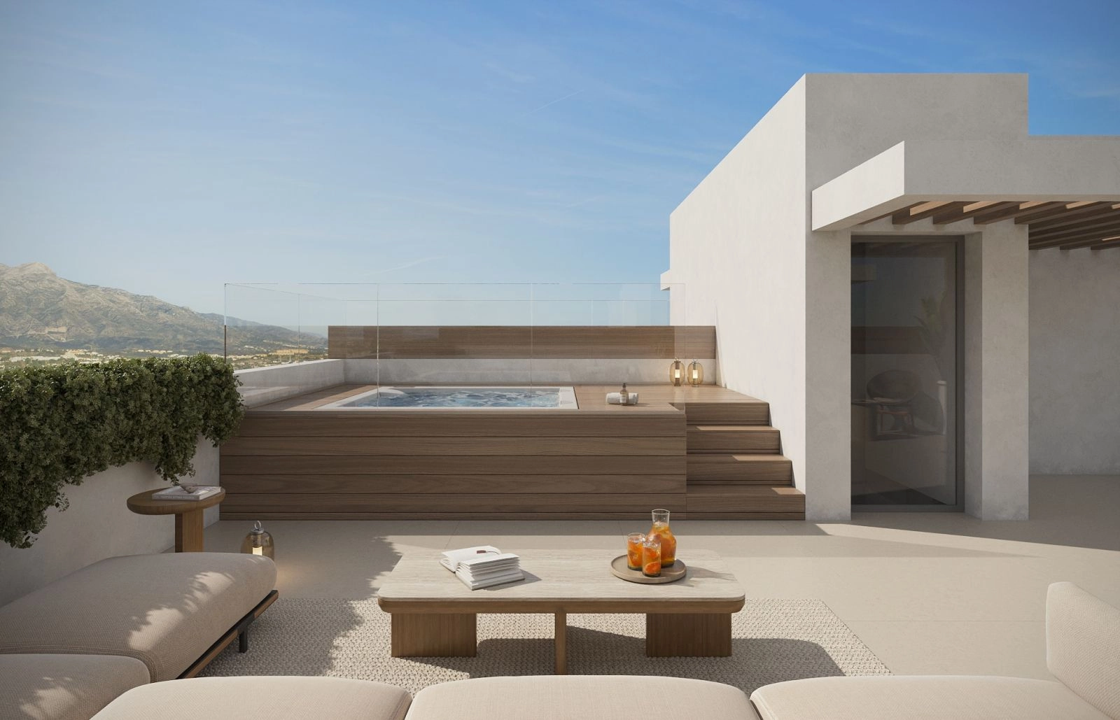 Dit private tagterrasse-solarium, et ideelt sted at slappe af i jacuzzien med udsigt over bjergene.