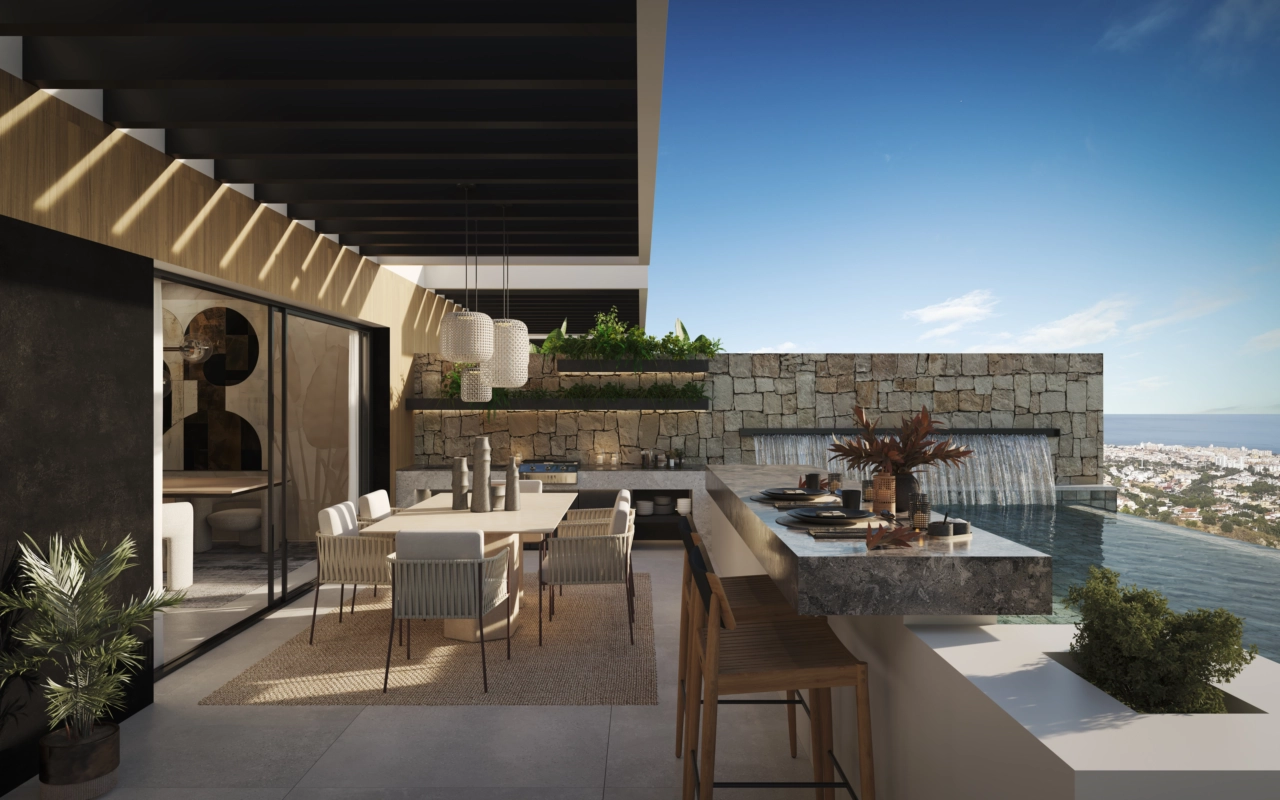 Et udekøkken og en bar gør det til en sand fornøjelse at underholde venner og familie.