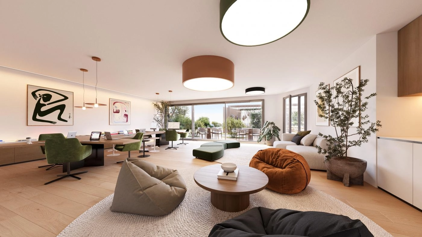 En alsidig og stilfuld co-working og social lounge, hvor beboerne kan arbejde, mødes eller slappe af i komfort.