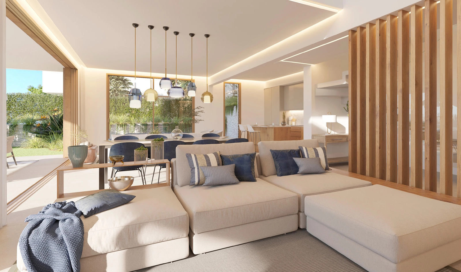 Åbne interiører forbinder problemfrit med udeterrassen og skaber et perfekt rum til underholdning.