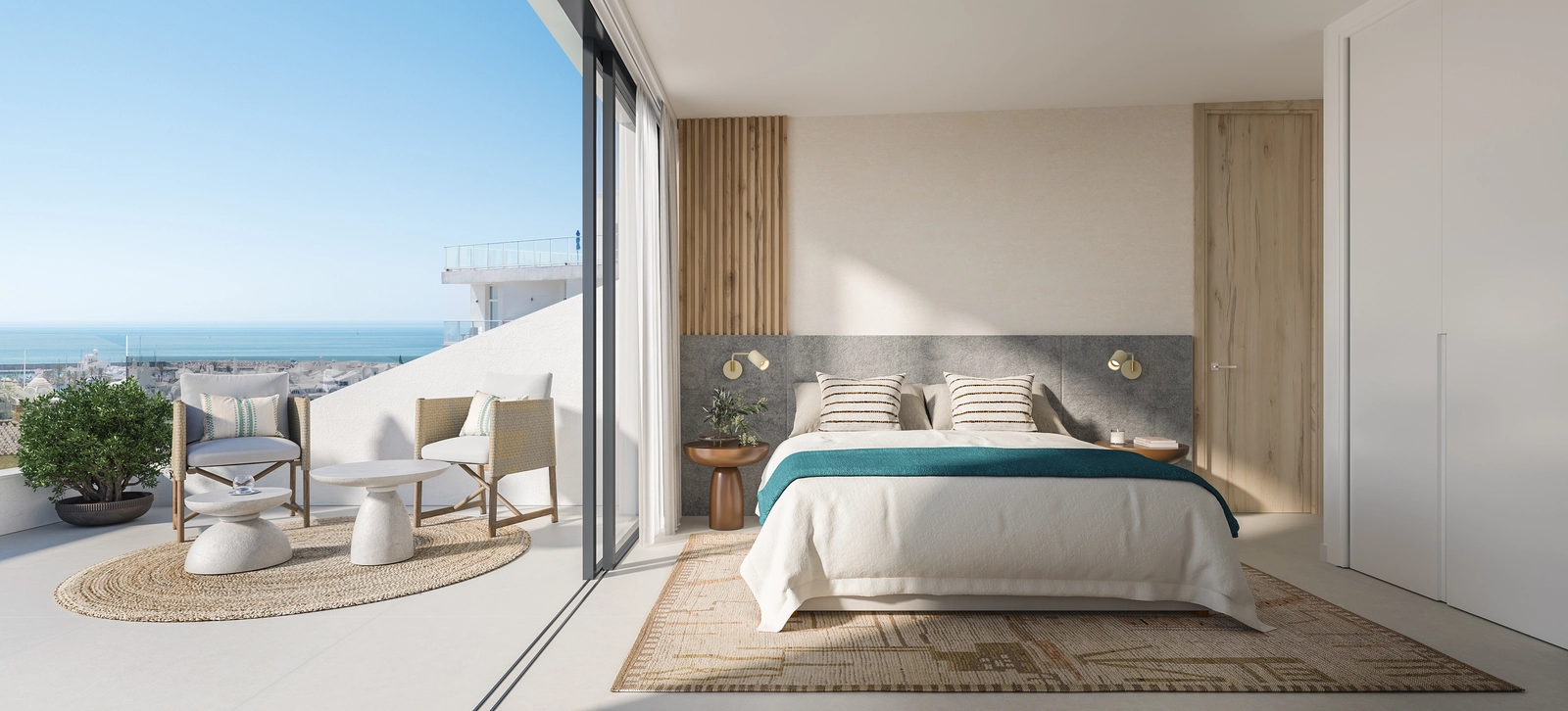 Et lyst og fredfyldt soveværelse med direkte adgang til en terrasse med smuk havudsigt.