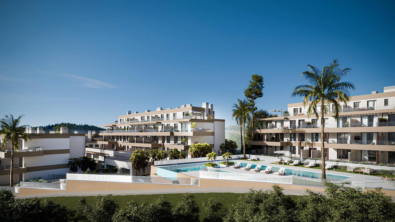 Et overblik over det moderne boligkompleks, der fremhæver dets moderne arkitektur og smukke poolområde.