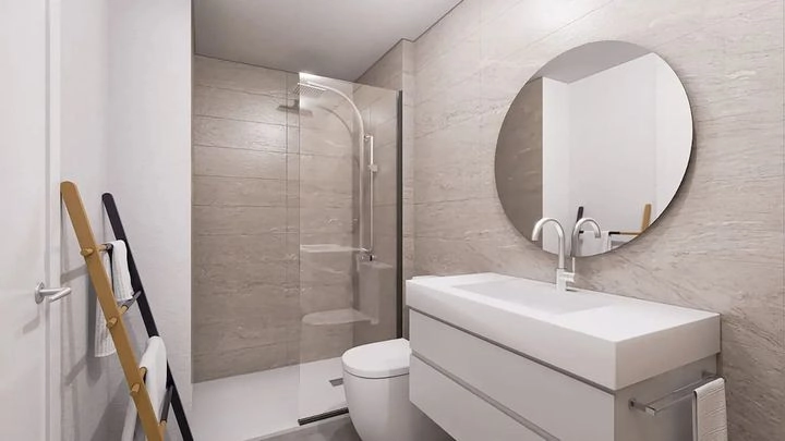 Moderne badeværelser er udført med elegante materialer af høj kvalitet.
