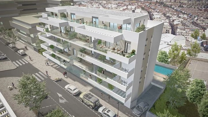 Et overblik over bebyggelsen, der fremhæver dens moderne arkitektur og fælles poolområde.