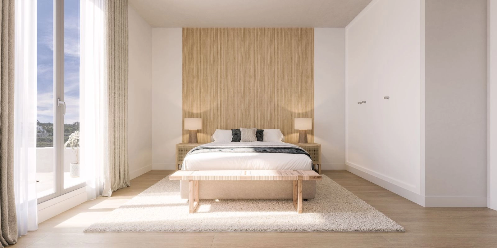 Elegant designede soveværelser tilbyder et roligt rum for hvile og afslapning, fyldt med naturligt lys.