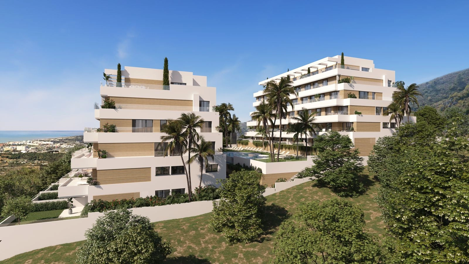 En hævet udsigt over det moderne boligkompleks, der viser dets fantastiske arkitektur og udsigt mod Middelhavet.