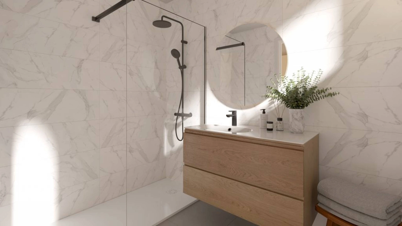 Moderne badeværelser med materialer af høj kvalitet og moderne design for en spa-lignende oplevelse.