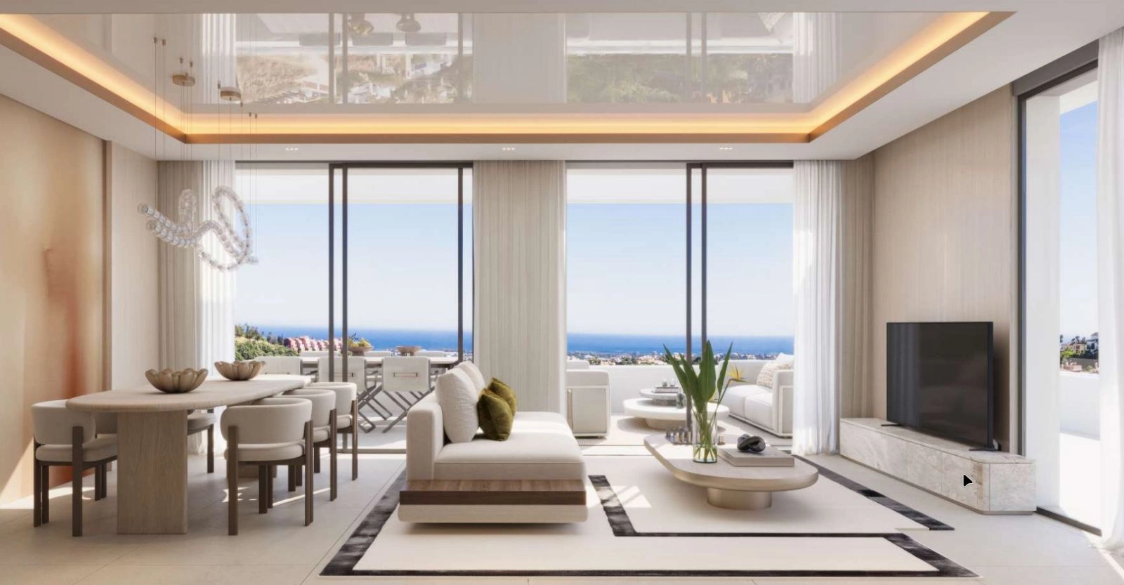 Solrige opholdsrum er designet med elegance og åbner op til en fantastisk havudsigt.