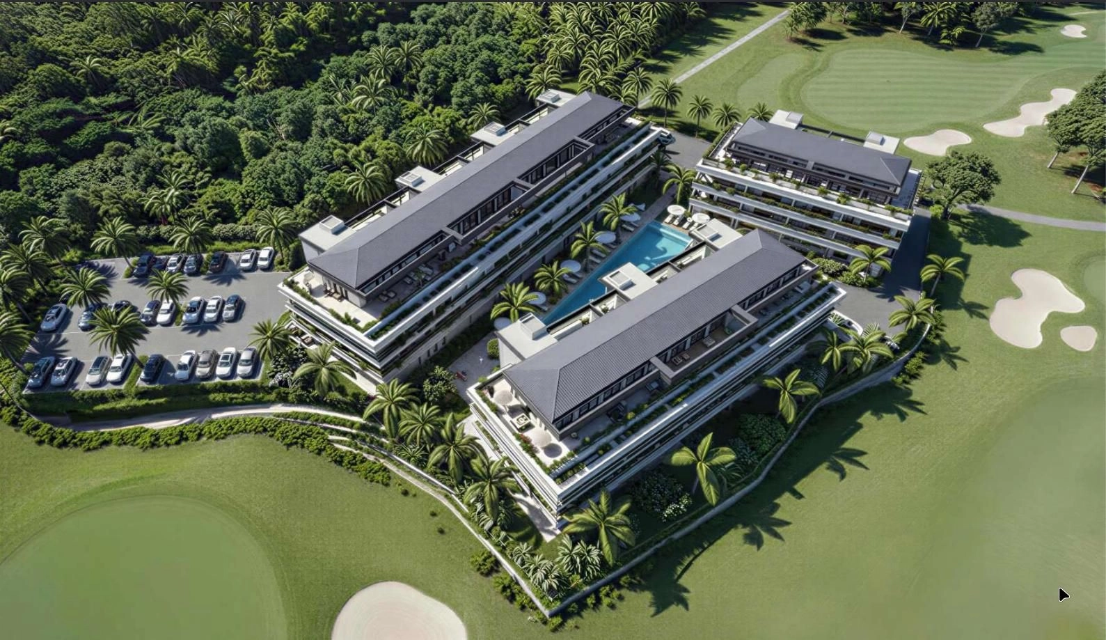Et luftfoto, der viser de tre moderne bygninger omgivet af grønne fairways.