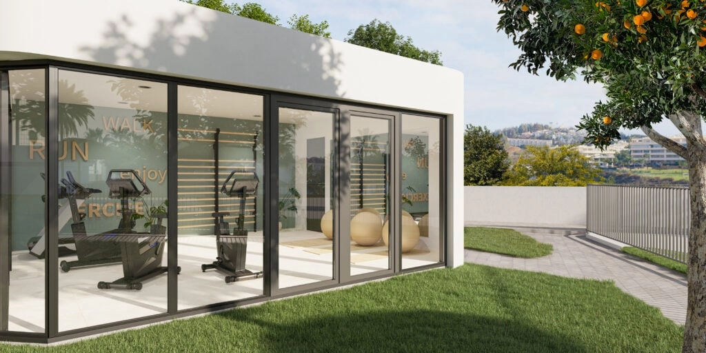 Oprethold en sund livsstil i det fuldt udstyrede, moderne fitnesscenter for beboere.