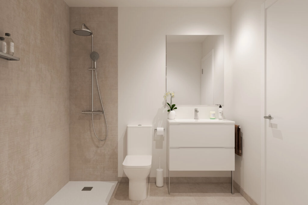 Et stilfuldt og moderne badeværelse med armaturer af høj kvalitet og et rent, minimalistisk design.