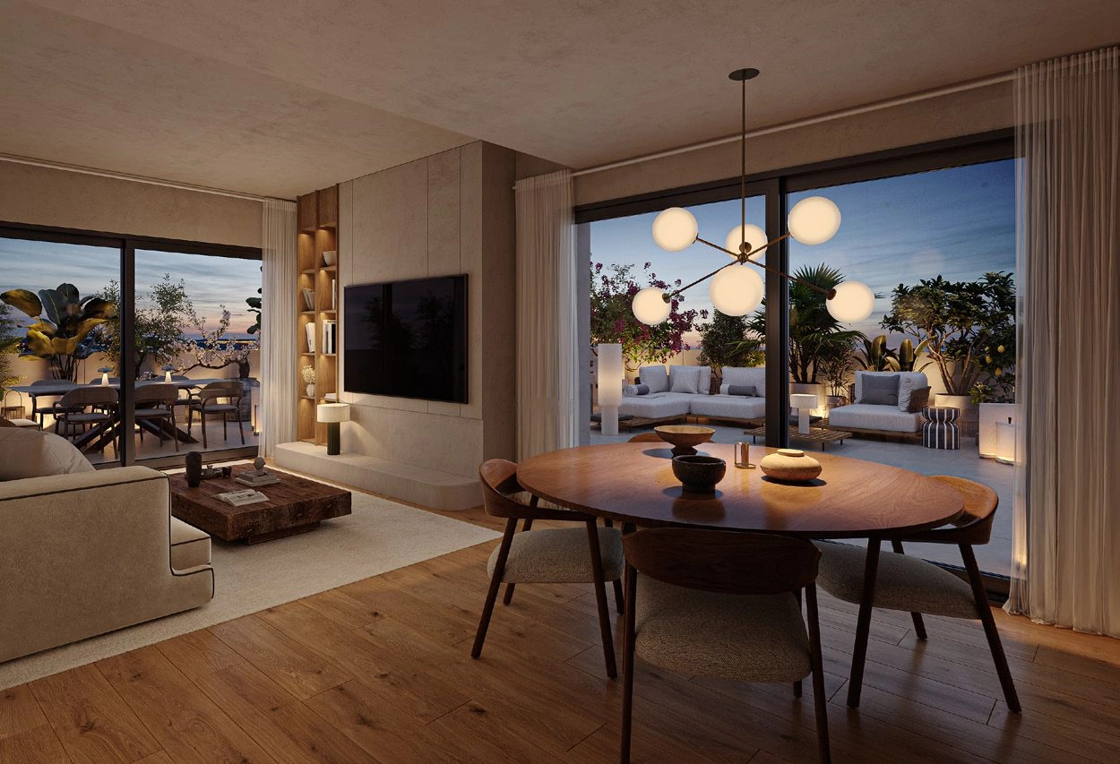 Det åbne stue- og spiseområde er perfekt til afslappende aftener med familie og venner.