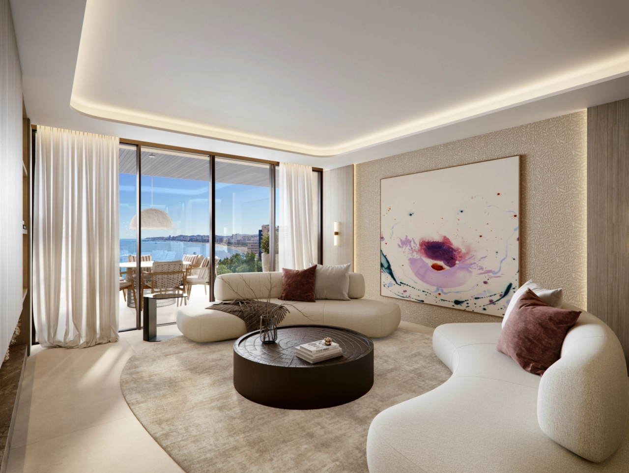 Opholdsområdet er designet til at flyde ubesværet ud på terrassen, hvilket skaber en lys og åben livsstil, der forbinder inde og ude.