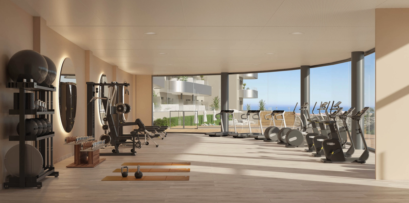 Det topmoderne fitnesscenter tilbyder inspirerende udsigt over Costa del Sol, mens du træner.
