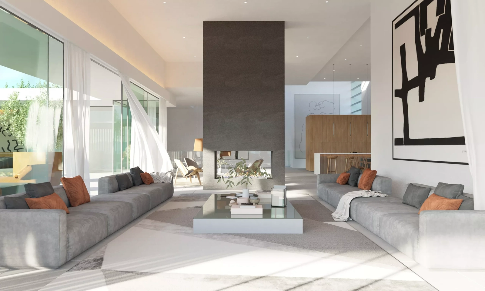 En central dobbeltsidet pejs skaber en varm og indbydende atmosfære i det åbne opholdsrum.