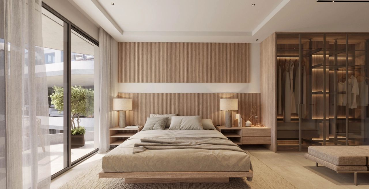 Mastersoveværelset tilbyder et roligt tilflugtssted med elegant design, rigelig skabsplads og direkte adgang til en privat terrasse.