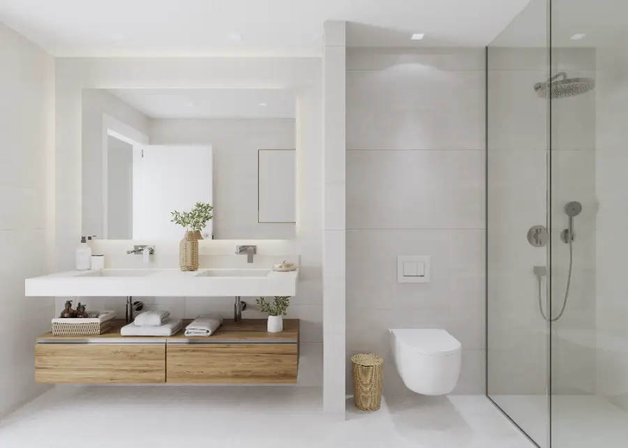 Et stilfuldt hovedbadeværelse med finish af høj kvalitet, dobbeltvask og en rummelig walk-in bruser.