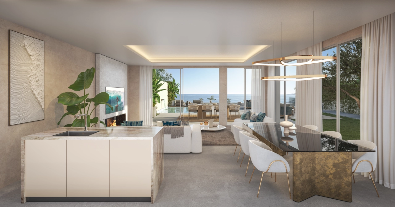 Et åbent opholdsområde, der problemfrit forbinder udearealerne og havet.